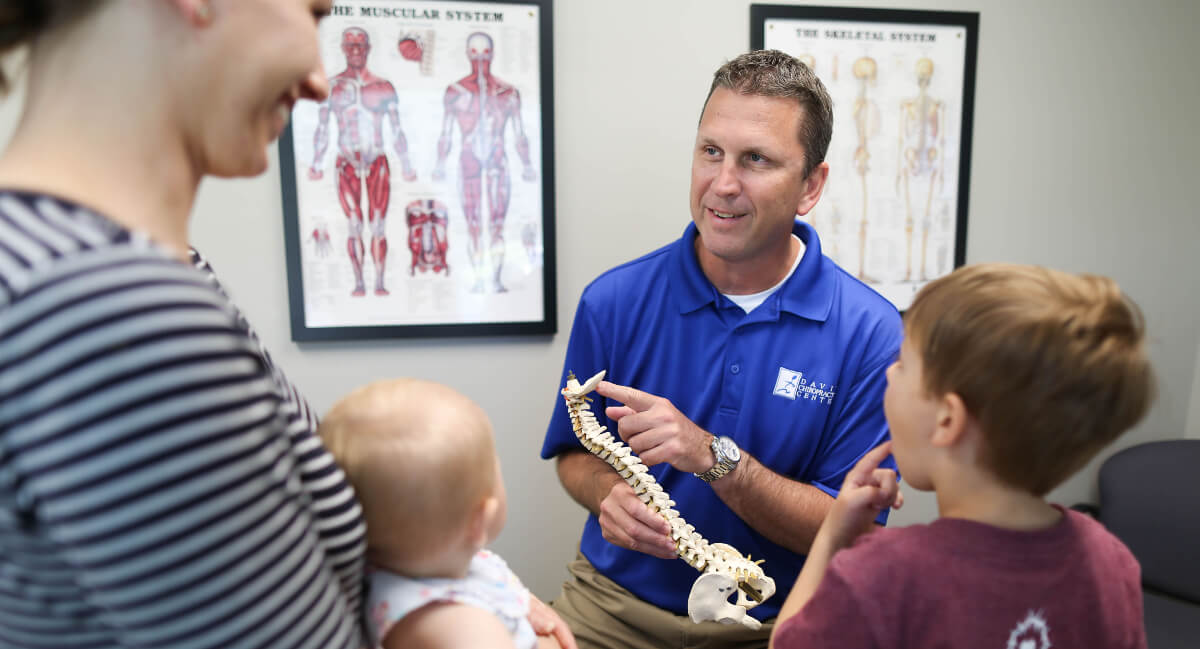 Chiropractic consult with mom and kids