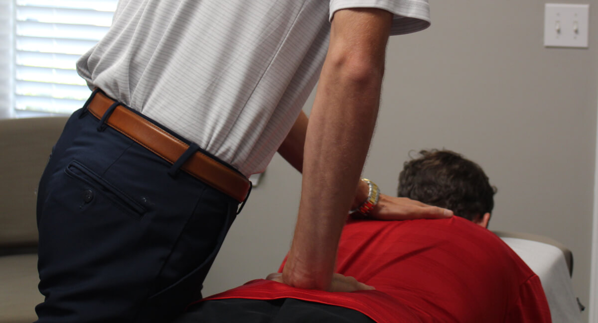 Peachtree City patient receiving a back adjustment