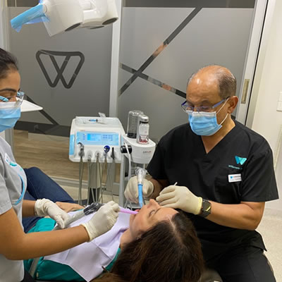 Dentist working on patients mouth