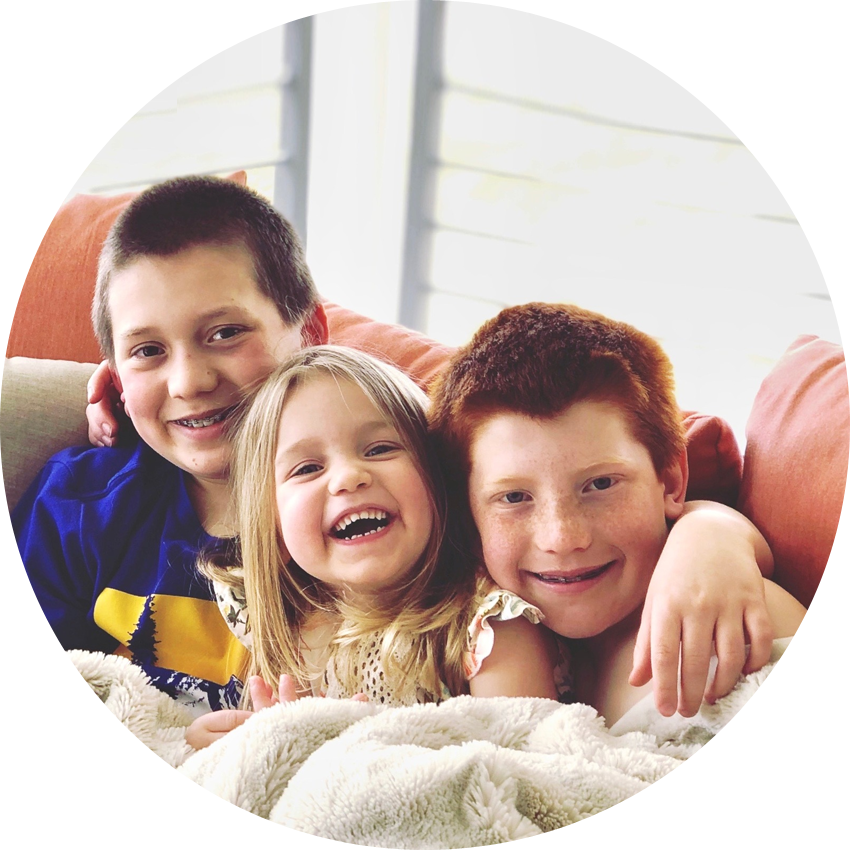 three kids smiling