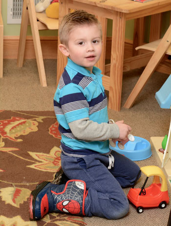 Boy playing with toys at Inner Balance Chiropractic