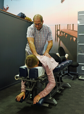 Dr Jeff adjusting a patient
