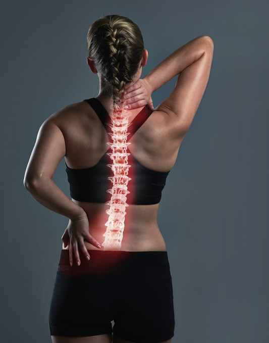 woman with spine illustration on back