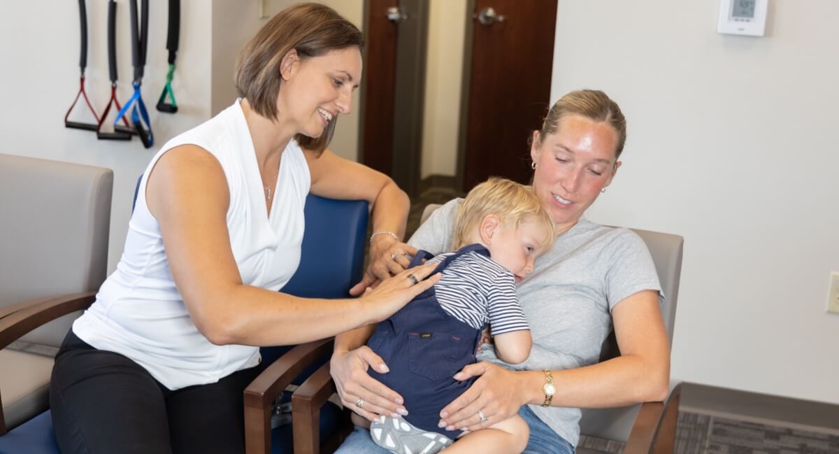 Dr. Heather Dwyer of Dwyer Chiropractic adjusting pediatric patient