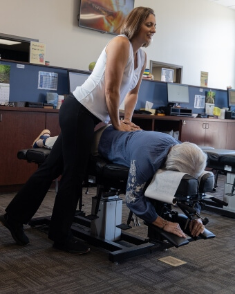 London chiropractor adjusting patient