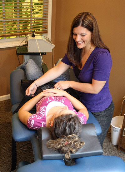 chiropractor Forest City adjusting a patient