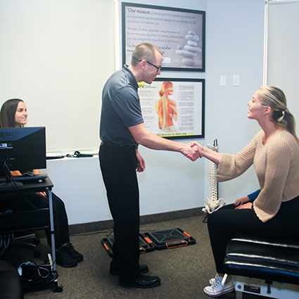 Dr. Ryan greeting a new patient