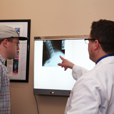 Dr. Smith reviewing xrays with patient