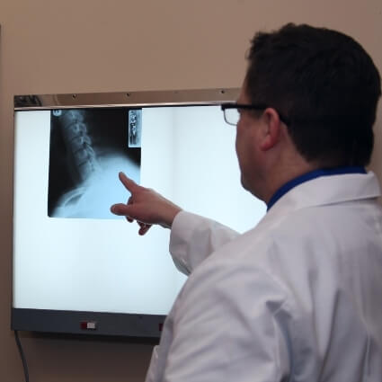 doctor reviewing xrays