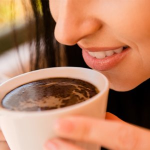 woman drinking coffee