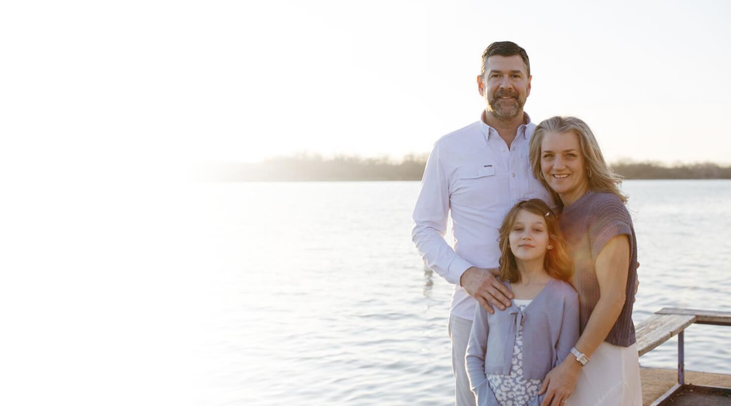 Dr. Derik Sanders and family outside