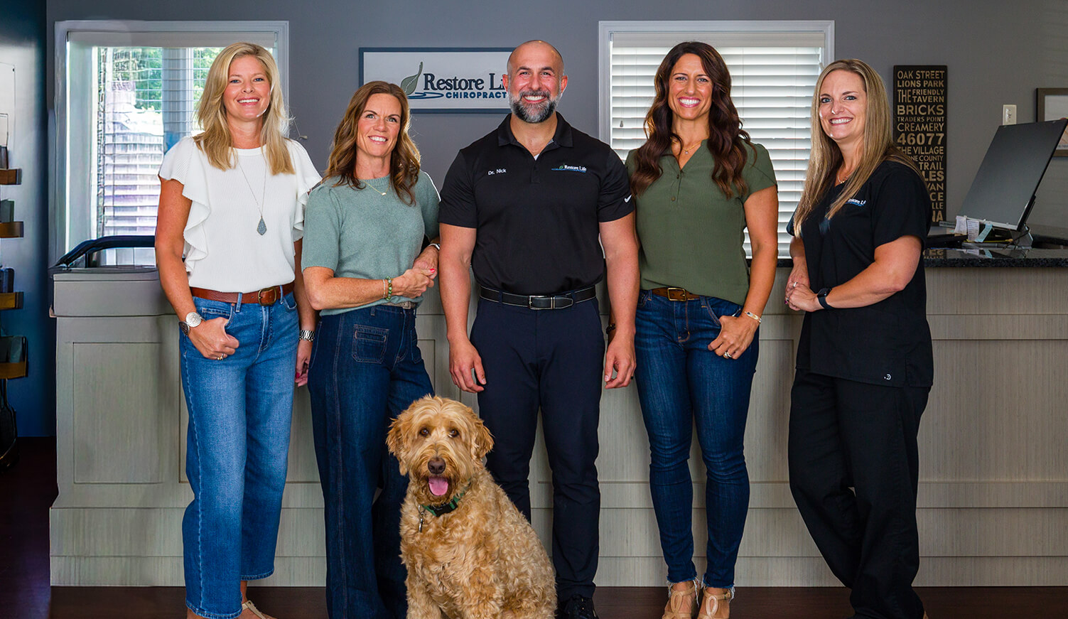 Chiropractors at front desk