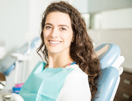 Smiling female dental patient