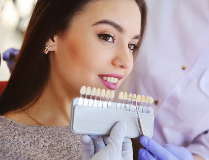 Female patient dental veneers