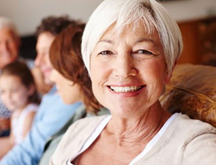 Woman smiling on the couch