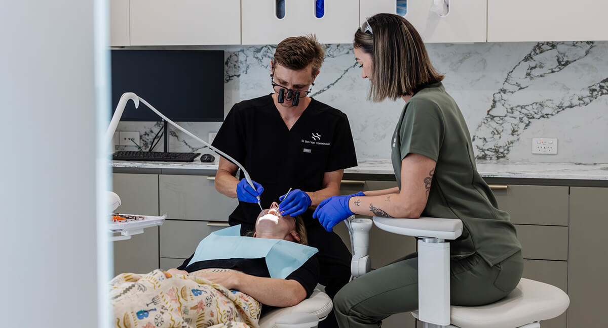 Patient getting treatment from dentist