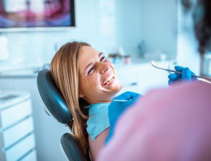 person laughing during a dental visit