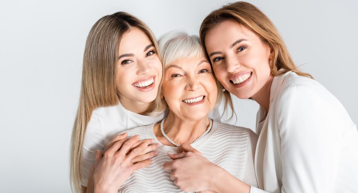 Three woman with big smiles