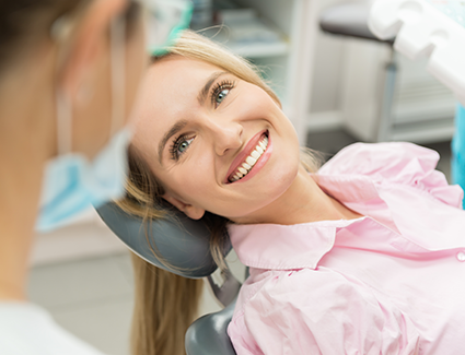 woman smiling during dental visit