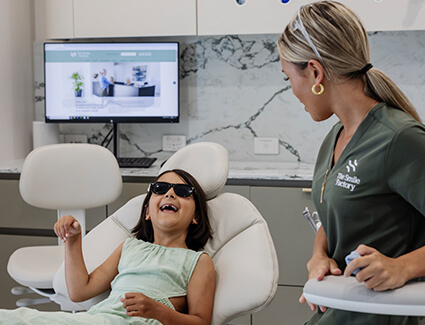 Young girl in dental chair