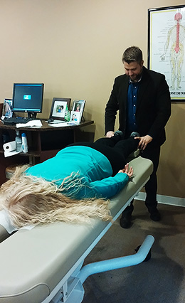 Dr. Patterson adjusting a patient Spring Hill Chiropractor Dr. Patterson