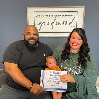 Family holding certificate