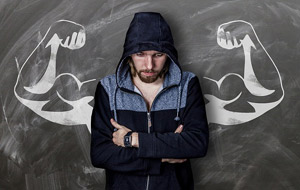 Man in front of chalkboard