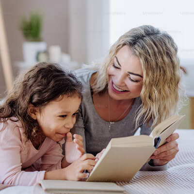 mom child reading book