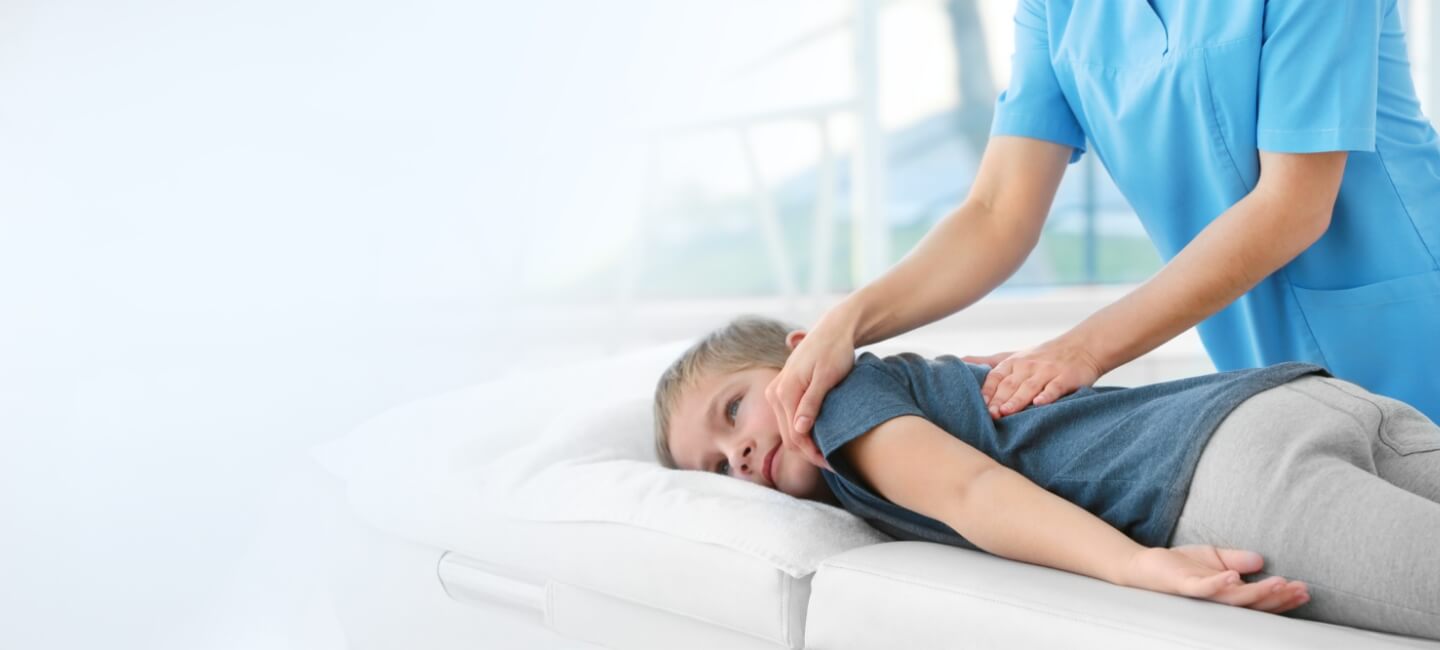 child having back adjusted