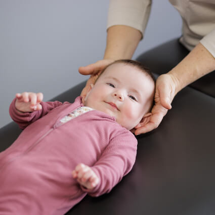 happy baby getting adjusted