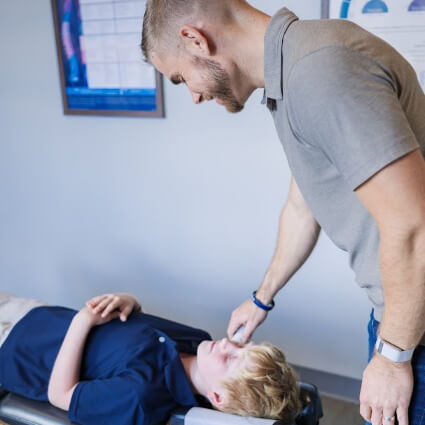 child on adjusting table