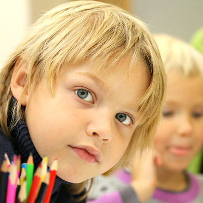 little boy in class