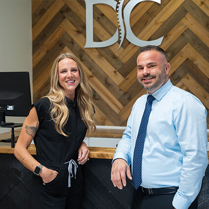 Dr Adam with assistant