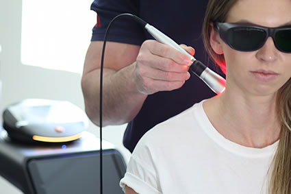Laser Therapy on woman's neck
