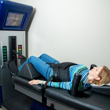 patient on spinal decompression table