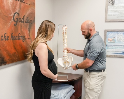 dr josh reviewing spine structure pregnancy