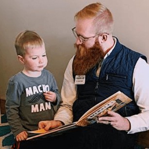 Doctor reading to a child