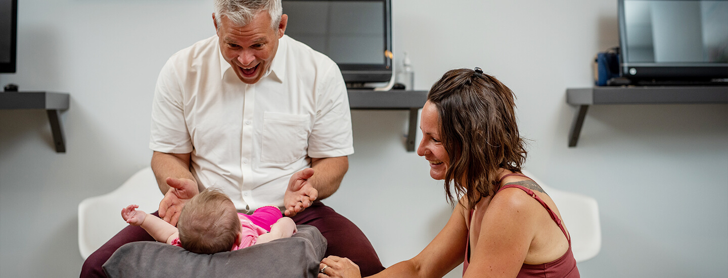 Dr playing with baby