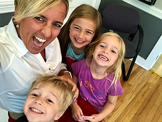 Dr. Katie Pinkus with her pediatric chiropractic patients
