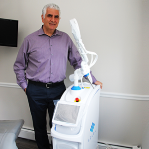 Dr. Tony standing by SOLEA Laser