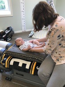 baby's chiropractic adjustment