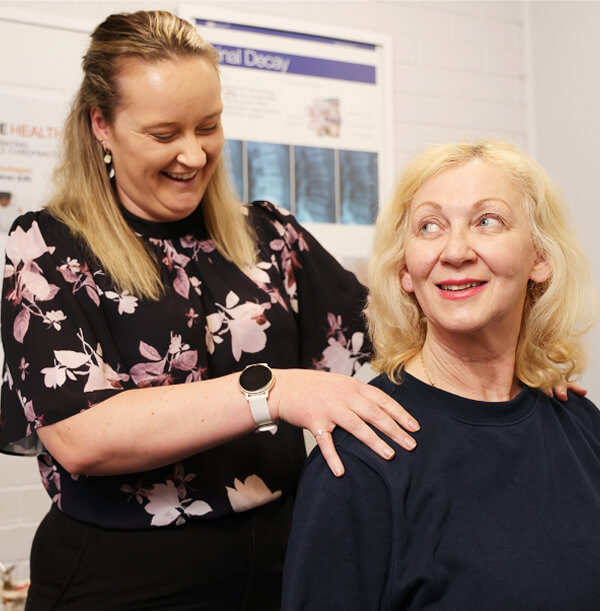 chiropractor with patient