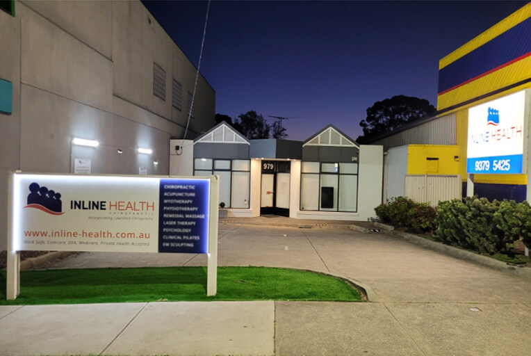 Inline Health Chiropractic Essendon building exterior at night