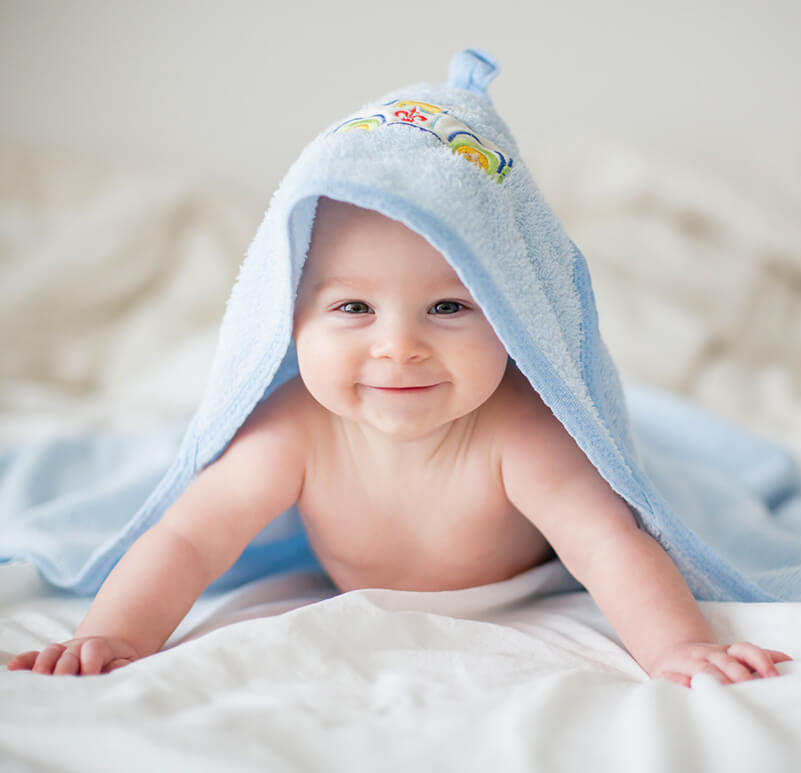 cute baby with towel on head