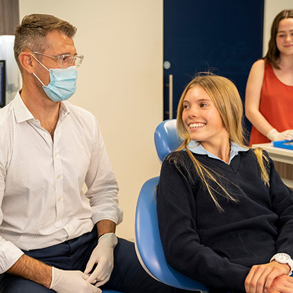 Dr Riaan and patient smiling