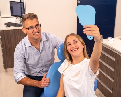 Dee Why dentist in consultation with a patient