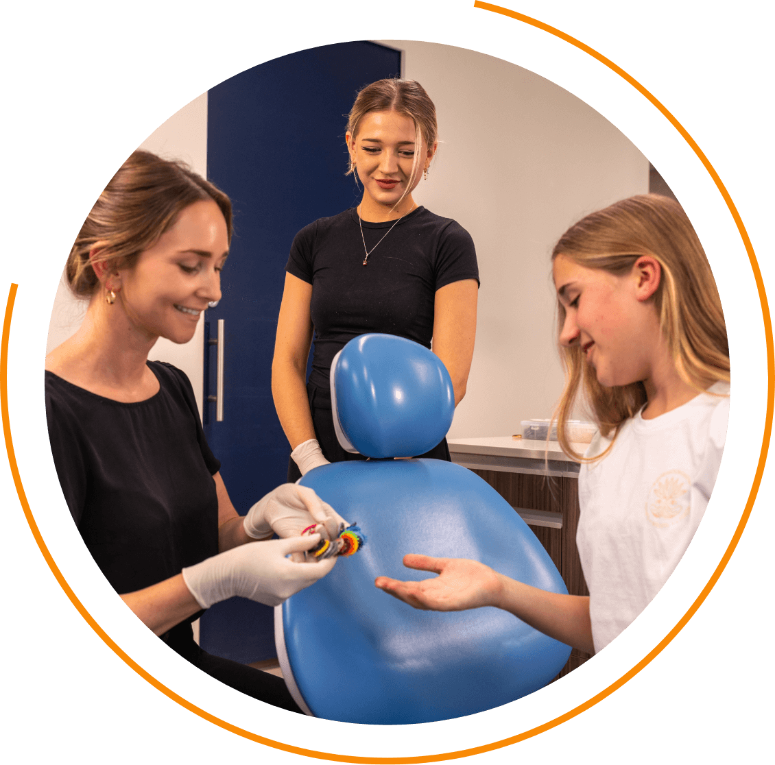 Wavescape Orthodontics staff assisting orthodontic patient