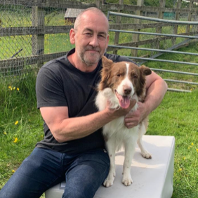 Dr Anthony with another happy doggy