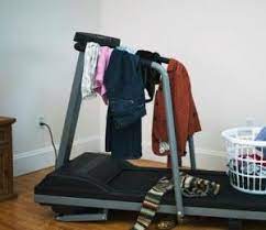 Tread mill clothes rack