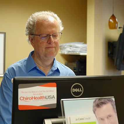 Dr. Whalen at computer
